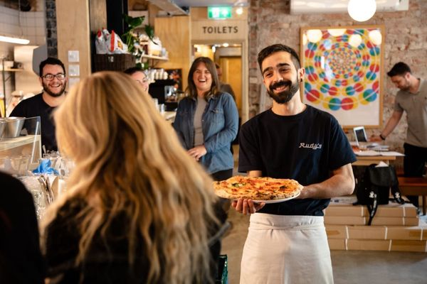 Waiter at Rudy's at Tottenham Court Road, London